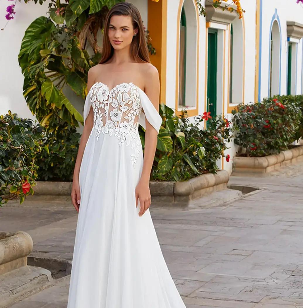 Simple and Chic Wedding Dresses With Love by Enzoani Image